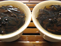 8892後期紅印圓茶と黄印7542七子餅茶