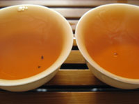 8892後期紅印圓茶と黄印7542七子餅茶